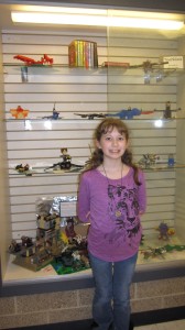 Kayla and the Lego display. The 1st prize winner is in the lower left.
